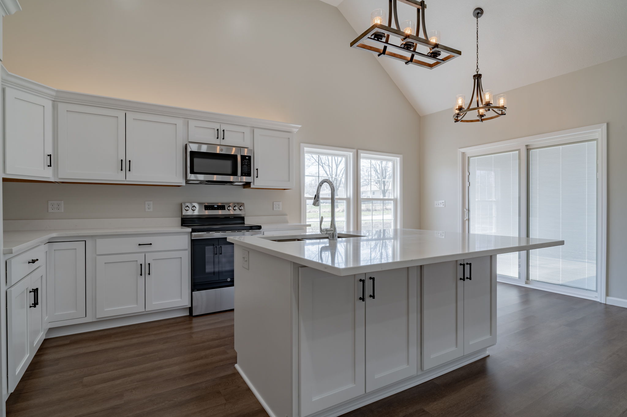 Open kitchen and living area with modern farmhouse décor 2